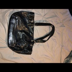 Small, black leather purse.